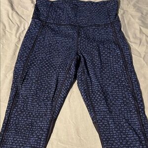 Lululemon workout wear with mesh on bottom back legs